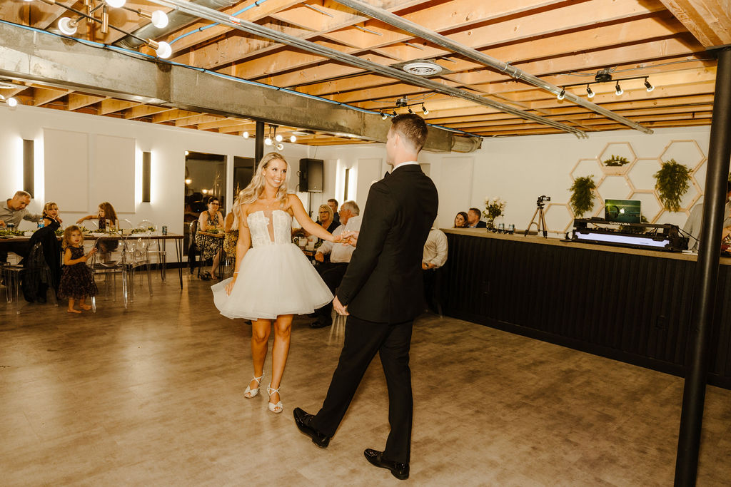 bride and grooms first dance a black and white themed wedding