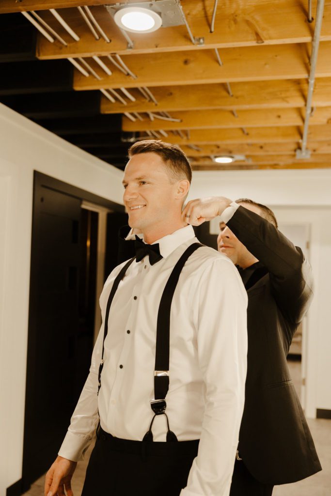 groom getting ready before wedding