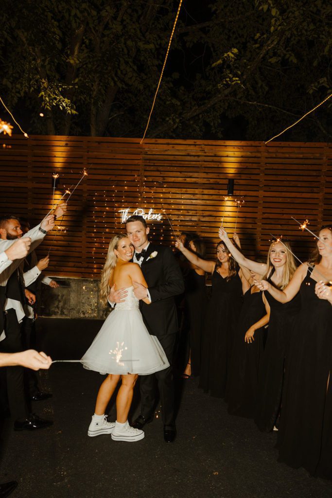 bride and groom sparklers exit after wedding reception