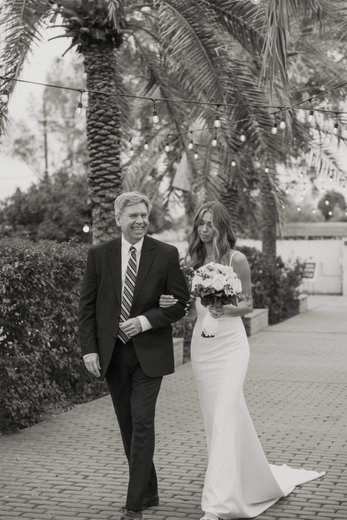 bride and father of bride walking down the aisle photographed by phoenix wedding photographer 